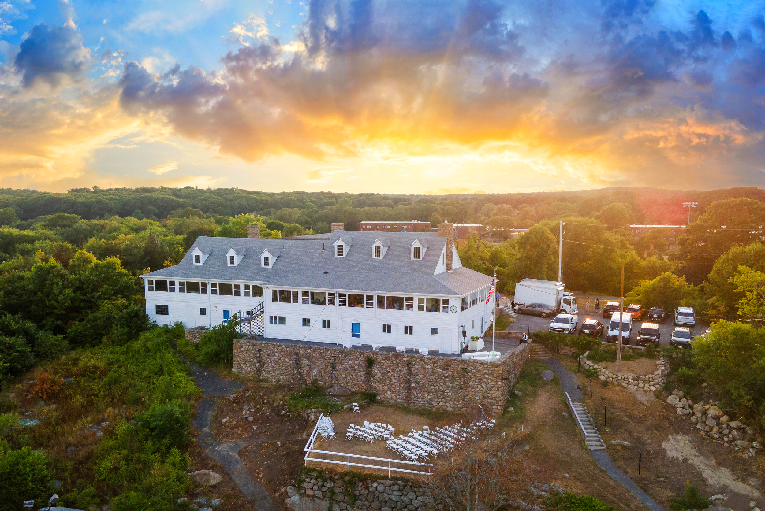 Arial view of clubhouse with sunset